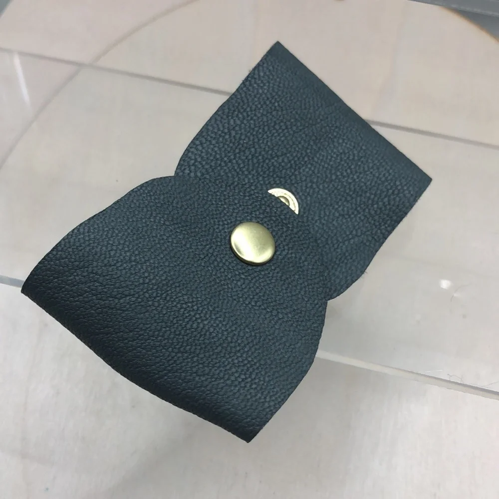 Soft leather bow shaped bracelet.